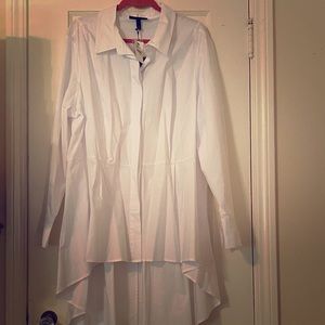 White hi-low blouse with hidden buttons.